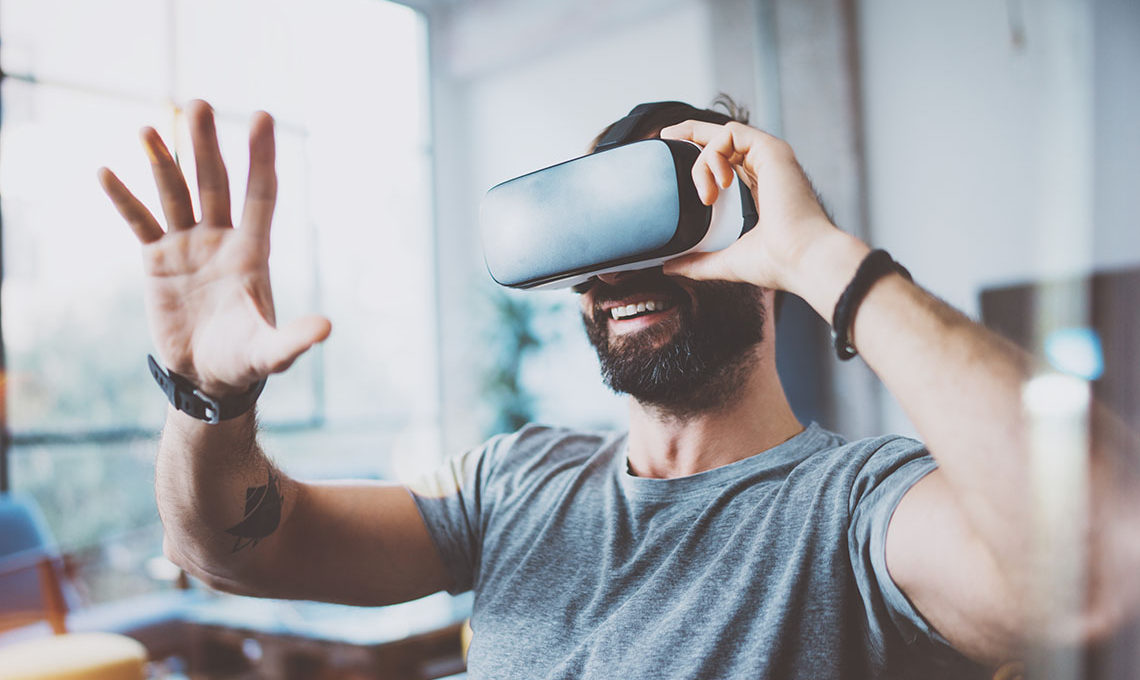 Man using virtual reality head set